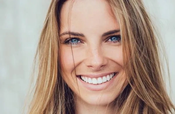 Healthy smile after cosmetic dental treatment at West House Dental, Pinner
